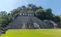 Ancient Mexico Ruins in Archaeological Site with Pyramid, Temple, Grass and Trees Royalty Free Stock Photo