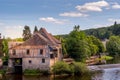 Ancient mill on the banks of the Creuse river in Argenton sur Creuse Royalty Free Stock Photo