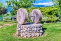 Ancient millstone in the countryside Royalty Free Stock Photo