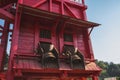 Ancient mining structure in the shape of a tower with its characteristic red color