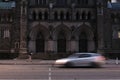 Ancient church and passing car