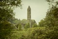 Ancient monastery in Glendalough, Wicklow Mountains of Ireland - travel photography. Stone monastic Church of Saint Kevin. Royalty Free Stock Photo