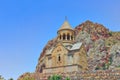 Ancient Monastery Noravank built of natural stone tuff. Landscaped view of the stone mountains. Royalty Free Stock Photo