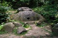 Ancient dolmen in the mountain forest of the Caucasus