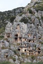 Ancient monumental lycian rock-cut tombs in archaeological site Myra near Demre, Turkey Royalty Free Stock Photo