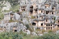 Ancient monumental lycian rock-cut tombs in archaeological site Myra near Demre, Turkey Royalty Free Stock Photo