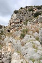 Ancient monumental lycian rock-cut tombs in archaeological site Myra near Demre, Turkey Royalty Free Stock Photo