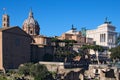 Ancient monuments, ruins and columns in Roman Forum. The Altare della Patria also known as the Monumento Nazionale a Vittorio Eman Royalty Free Stock Photo