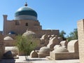 Ancient mosque with a green ceramic dome to Khiva in Uzbekistan.