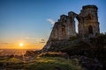 Ancient Mow Cop Castle at sunset with Sun star and blue sky in England Royalty Free Stock Photo