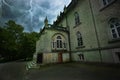 Ancient mystical house during a thunderstorm