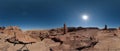 Ancient Nabataean Petra tombs and columns carved in sandstone - Jordan, clear sky with sunflare Royalty Free Stock Photo