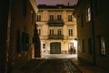 Ancient narrow night Vilnius street with old architecture