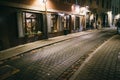 Ancient narrow night Vilnius street with old architecture