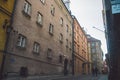 Ancient narrow Warsaw street with old architecture