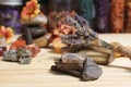 Ancient Native American Pottery Pieces With Crystals and Flowers on Meditation Table Royalty Free Stock Photo