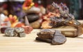 Ancient Native American Pottery Pieces With Crystals and Flowers on Meditation Table Royalty Free Stock Photo