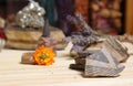 Ancient Native American Pottery Pieces With Crystals and Flowers on Meditation Table Royalty Free Stock Photo