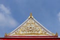 Ancient native Thai gable of Buddhism church and sky.