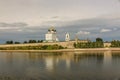 Ancient old fortress on the river bank bright clouds sky July 30rd 2016, Russia - Pskov Kremlin wall, Trinity Cathedral, Bell Towe Royalty Free Stock Photo