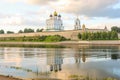 Ancient old fortress on the river bank bright clouds sky July 30rd 2016, Russia - Pskov Kremlin wall, Trinity Cathedral, Bell Towe Royalty Free Stock Photo