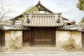 Ancient and old Japanese house gate in Nara, Japan under bright blue sky Royalty Free Stock Photo