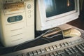 Ancient old and obsolete personal computer home use on old table wood. Obsolete technology concept. Royalty Free Stock Photo