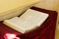 Ancient old Testament book lies on the altar Royalty Free Stock Photo