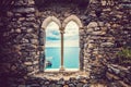Ancient old window with sea view. Porto Venere, Italy