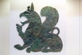 Ancient greek bronze votive griffin figures