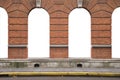 Ancient orange brick wall and interior vintage arch windows frame white white blank background in window display shop outside and