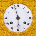 Ancient ornamental golden clock face