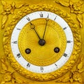 Ancient ornamental golden clock face