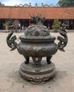 Ancient ornate bronze cauldron in the fourth courtyard of the Temple of Literature, Hanoi, Vietnam Royalty Free Stock Photo