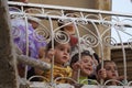 Local children viewing the ancient pagan Water Blessing Festival, celebrated in Armenia; photo taken in July 2009