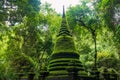 Ancient pagoda with moss plant at Phlio waterfall park, Chanthaburi