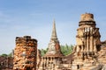 An ancient pagoda in an old temple and a very old brick wall in Ayutthaya, Thailand