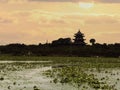 The ancient pagoda under the sunset Royalty Free Stock Photo