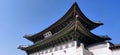 Ancient Palace in Seoul, Korea against blue sky Royalty Free Stock Photo