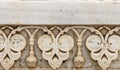 ancient pale elegant intricate decorative arabesque floral inlay reliefs marble border pattern
