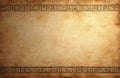 Ancient papyrus texture with Egyptian hieroglyphs border. Old parchment paper background with aged look. Historic document Royalty Free Stock Photo