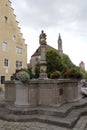 Ancient and particular fountain in the town of Rothenburg in Germany