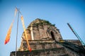 Ancient partly destroyed brick pagoda Wat Chedi Luang in Chiang Mai, Northern Thailand against blue sky Royalty Free Stock Photo