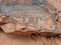 Ancient petroglyphs of people holding hands in Valley of Fire Nevada Royalty Free Stock Photo