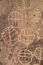 Ancient petroglyph rock art symbol