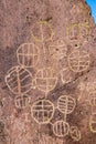 Ancient petroglyph rock art symbol