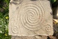 Ancient petroglyphs on the stone walls of an old house