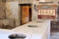 Ancient Pompeii restaurant with serving station Royalty Free Stock Photo