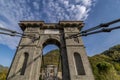 The ancient Ponte delle Catene bridge over the Lima stream, Lucca province, Italy, on a sunny day