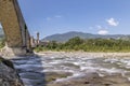 The ancient Ponte Gobbo bridge over the Trebbia river, Bobbio, Piacenza, Italy